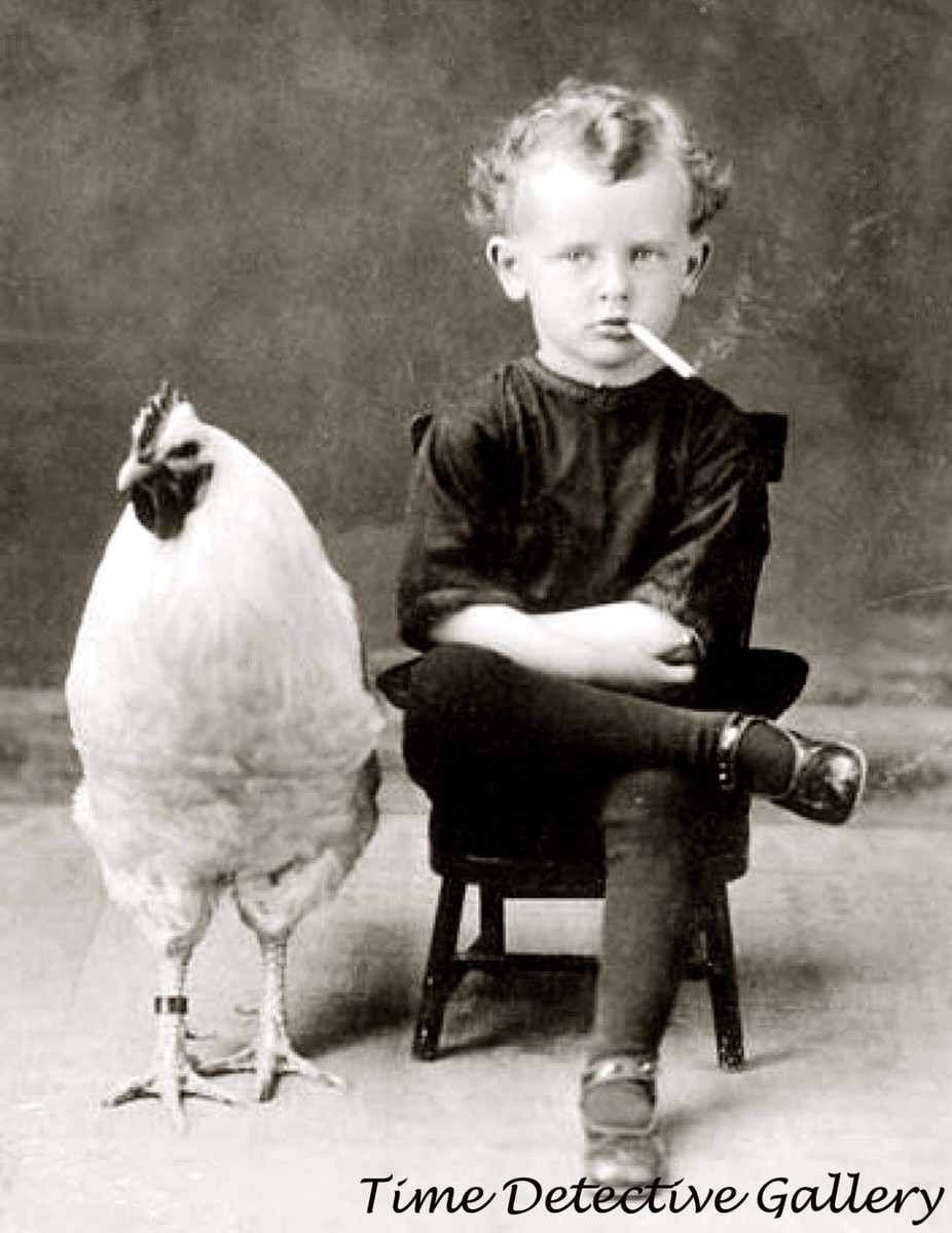 Young Boy Smoking a Cigarette with a Chicken - circa 1900 - Historic Photo  Print