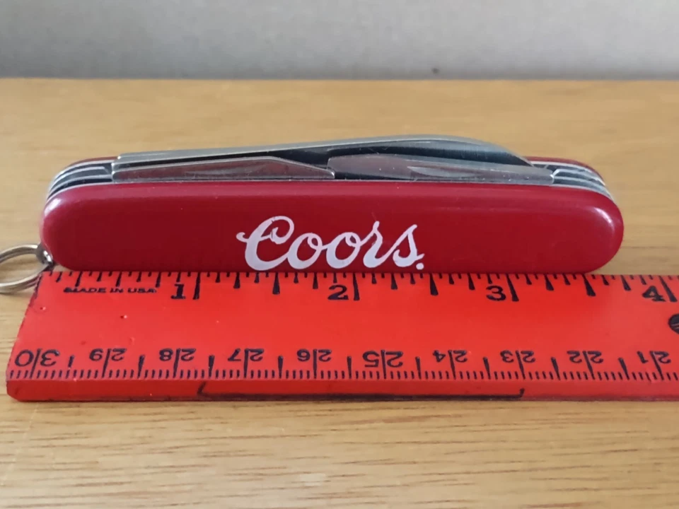 Colonial Prov. Faca de acampamento EUA / multi-ferramenta, publicidade COORS de aço inoxidável - Imagem 2 de 4