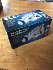Brand New Generic Wind Up Flashlight with FM Radio