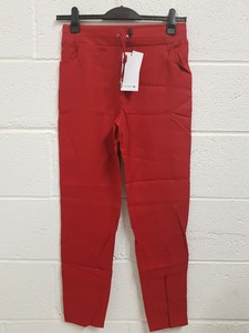 red lacoste trousers