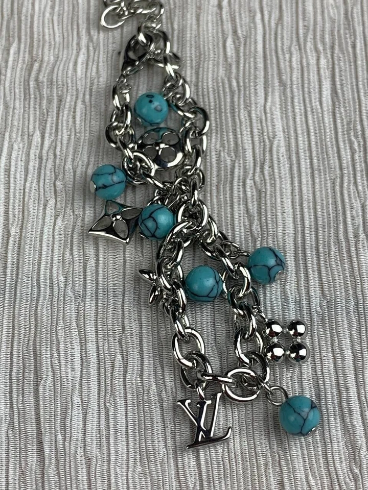 Pulsera Louis Vuitton cadena cuerda plata piedra azul Foto 2 de 4