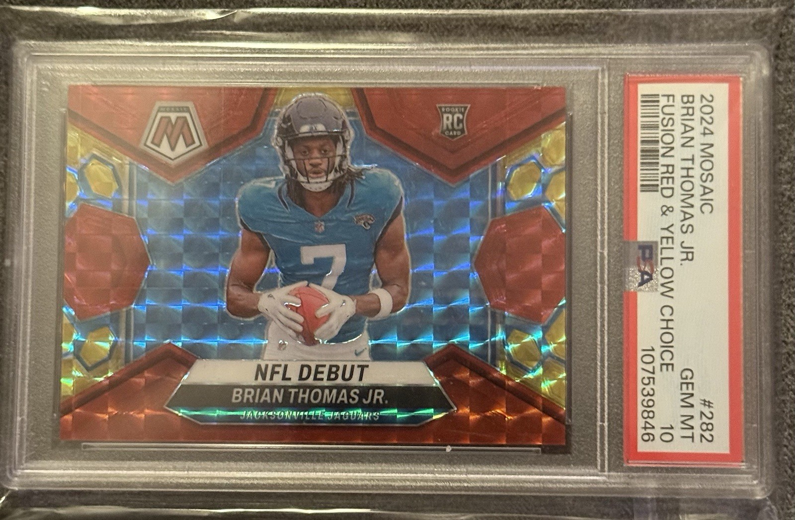 2024 Mosaic NFL Debut Brian Thomas Jr. Fusion Red & Yellow Mosaic Prizm /80 (RC)