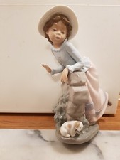 Lladro Nao Girl Figurine shearching for her  Puppy Daisa H20cm X W14cm Vgc