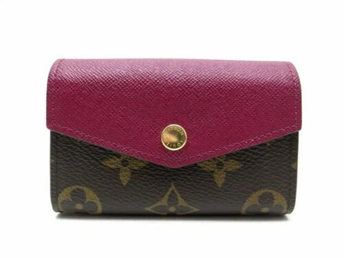 Porte-monnaie et portefeuilles marrons Louis Vuitton pour femme