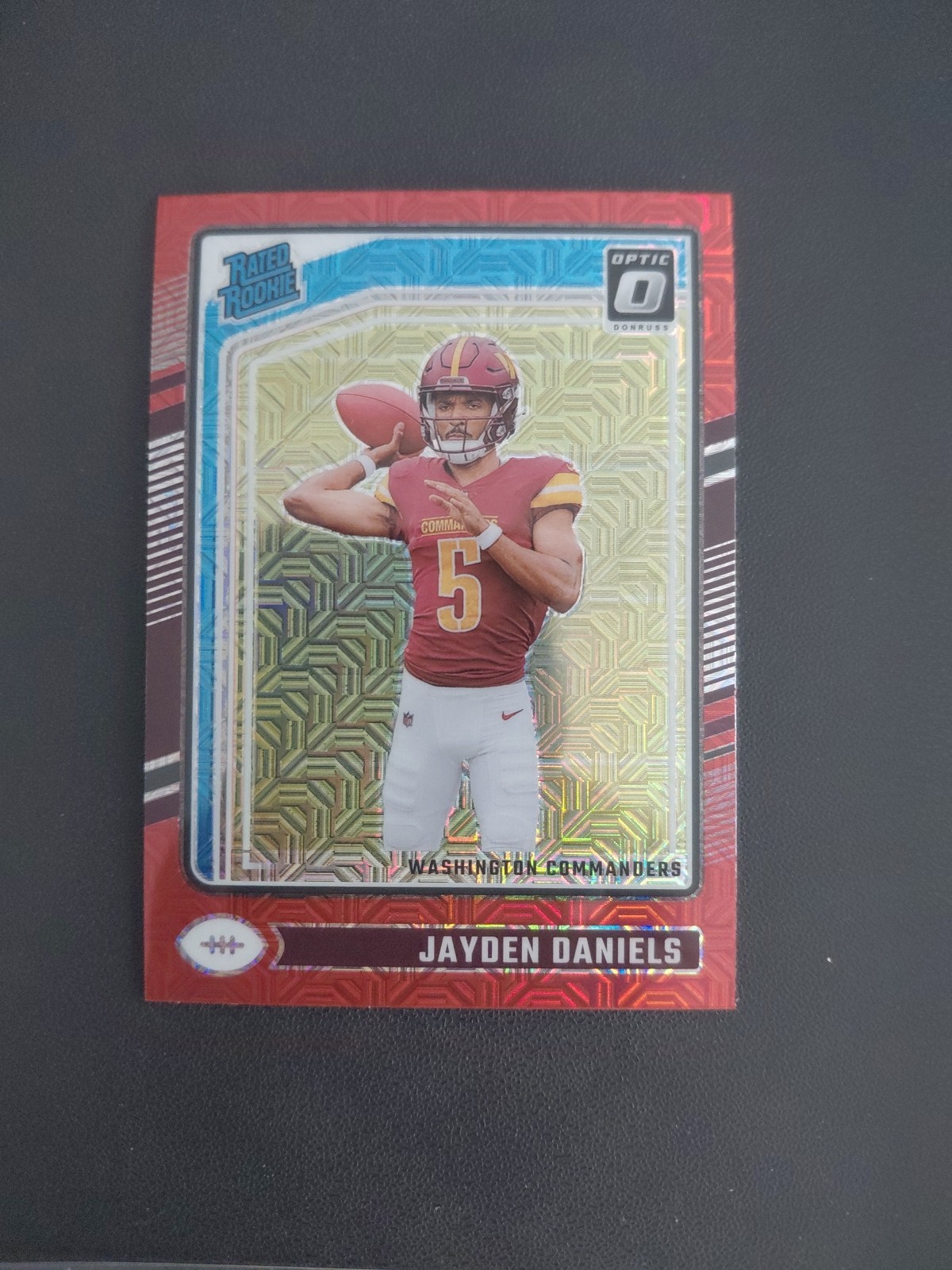 2024 Panini Donruss Optic #248 Jayden Daniels RC Red Mojo Prizm