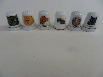 Eine Sammlung von 6 Porzellan Fingerhüte Katzen & Hunde Bilder.
