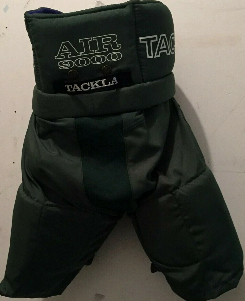 Pantalones de hockey sobre hielo verde oscuro con etiquetas de Tackla Foto 4 de 4