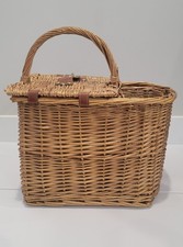 Vintage woven rattan or wicker picnic basket, the 1970s with citrus-print fabric