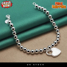 Genuine Sterling Silver Heart Charm Beaded stretch Bracelet for Women.