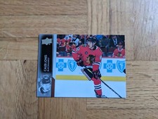 2021-22 UD Extended Series Base #541 Caleb Jones - Chicago Blackhawks