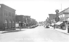 J69/ Hudson Wisconsin RPPC Postcard c40-50s Main St Stores 404