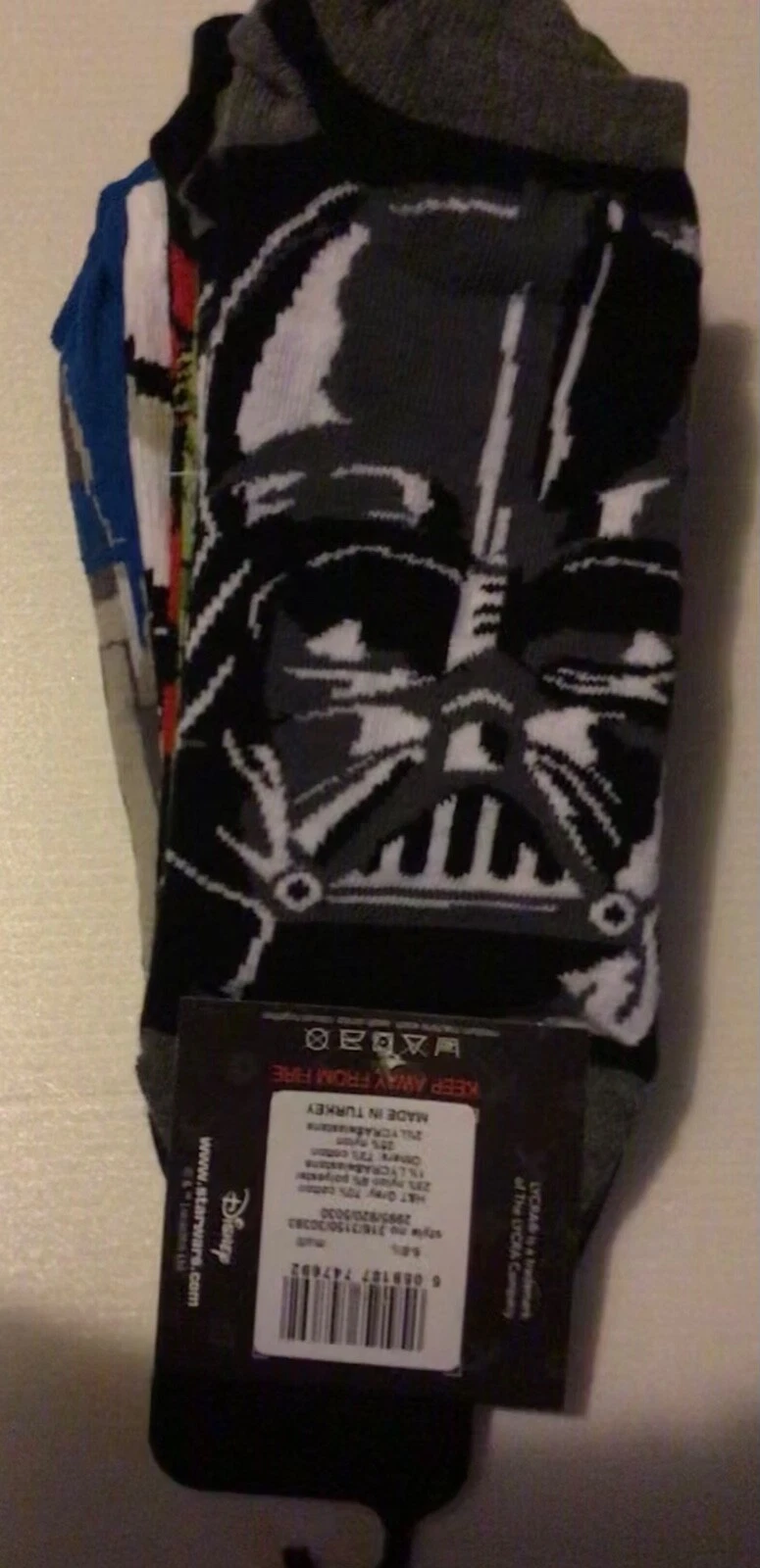 Men’s 5 pairs pack Black Trainer Socks with Star Wars detail.