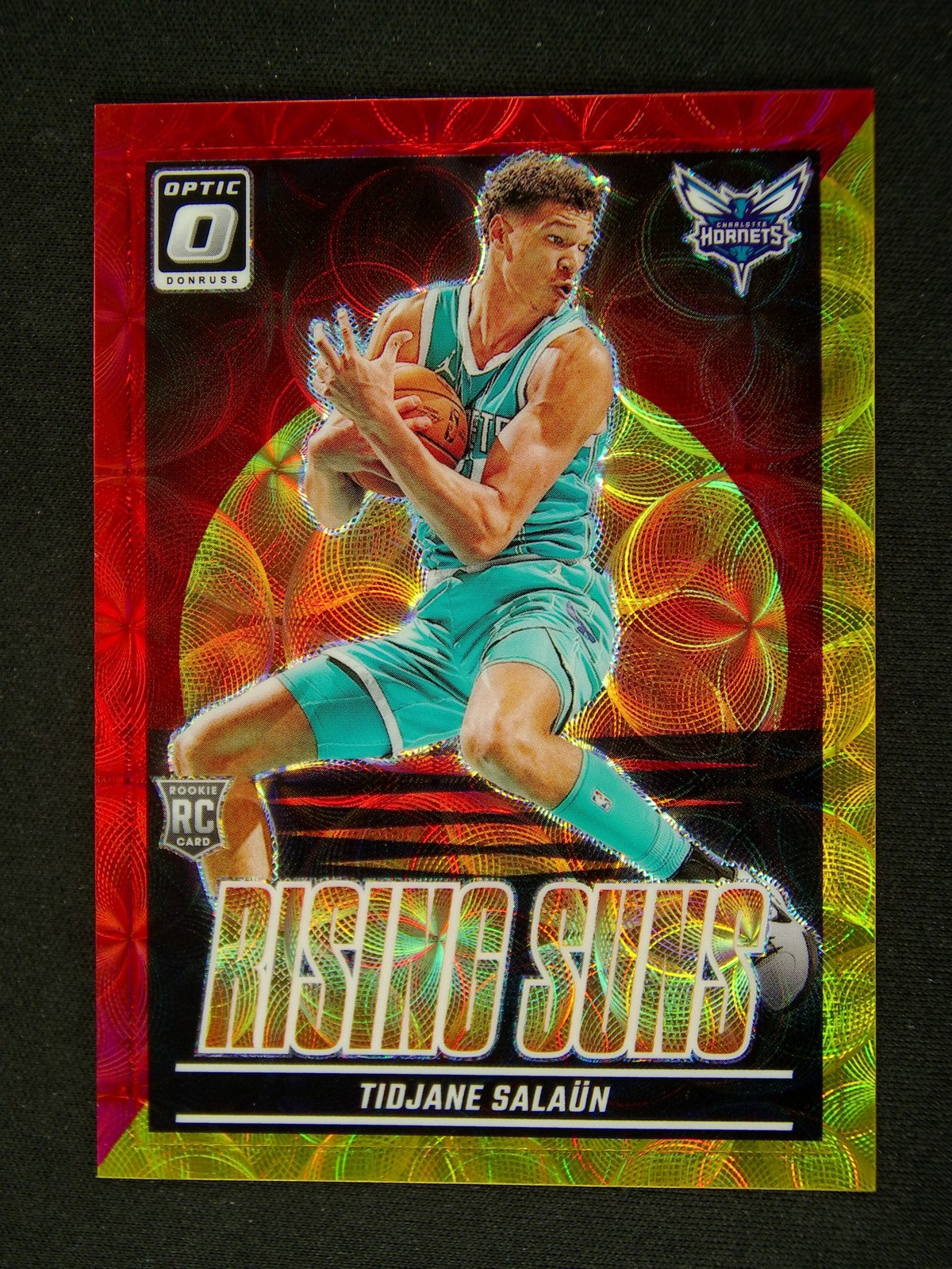 2024-25 Donruss Optic Tidjane Salaun #12 RC Rising Suns Red Gold Scope /99