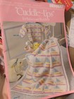Pre-owned Bernat *CUDDLE-UPS*Afghans for babies & toddlers — photo 1