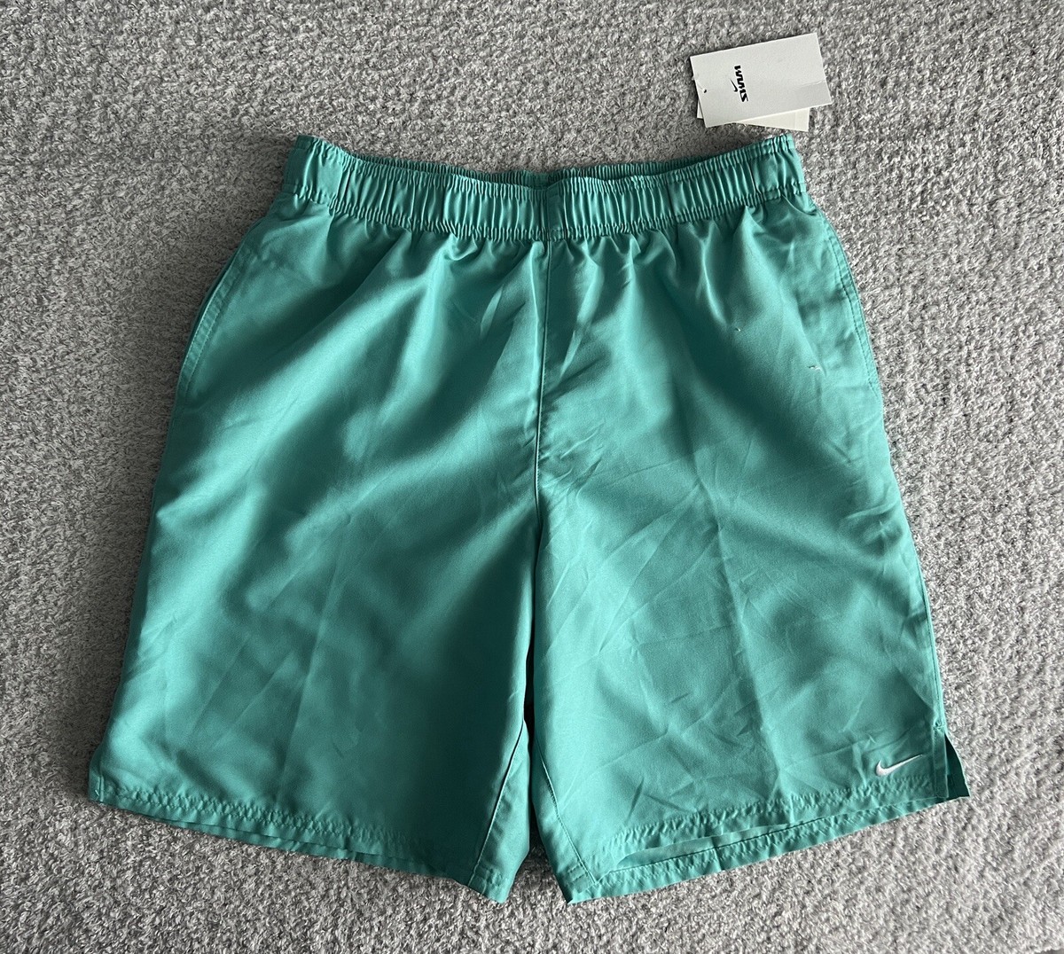 green nike swim trunks