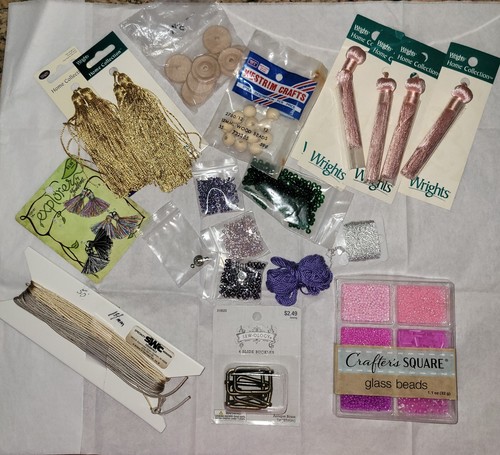 Beads, hassles, buttons, cord & misc ceaft items. New & Used.