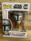 Funko Pop! Vinyl: Star Wars - The Mandalorian with the Child #402