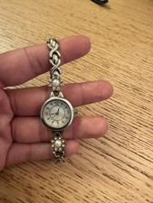 Women's Silver Bracelet Analog Wristwatch, Mother of Pearl Dial, Arabic Numerals