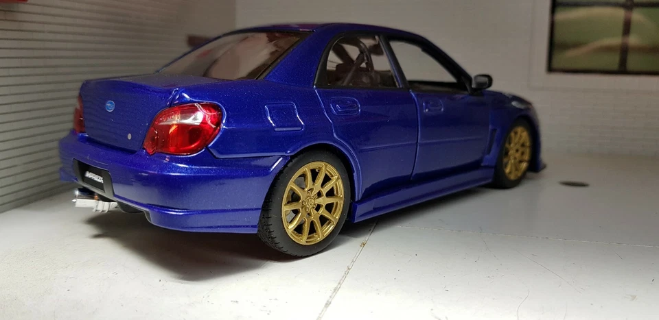 Subaru Impreza WRX STi Hawkeye Blue 2006 GD Welly 1:24 Scale Diecast Model Car - Image 3 of 4