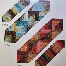 Plum Tree Quilts. Reversible Strippy Table Runner Pattern. 16" by 64". UNCUT