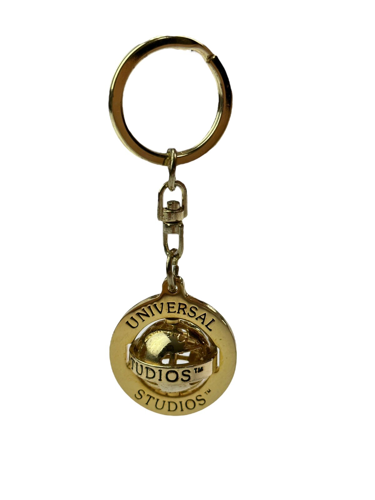 Llavero de latón Universal Studios planeta giratorio - divertido tono dorado tierra giratorio