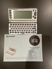 Sharp Wizard OZ-750 Electronic Organizer, Non Functioning, Fixable. Parts Only.