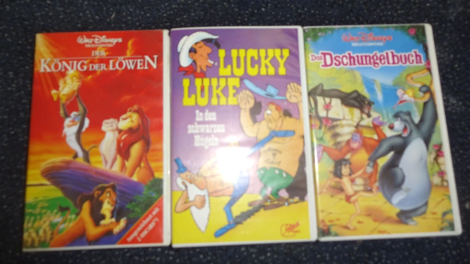 VHS KASETTEN  KÖNIG DER LÖWEN  LUCKY LUKE  DSCHUNGELBUCH  GEBRAUCHT - Bild 1 von 3