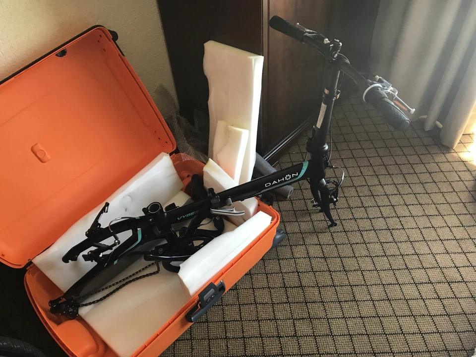 Dahon VYBE City Folding Bike and Orange Hard shell Samsonite Suitcase - Image 4 of 4