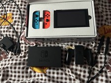 Nintendo Switch Console Handheld System Dockable w/ Neon Red/Blue Joy-Con & Dock