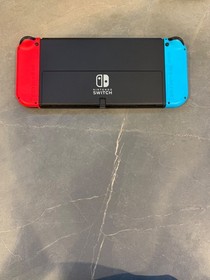 Nintendo Switch &ndash; OLED Model w/ Neon Red & Neon Blue Joy-Con