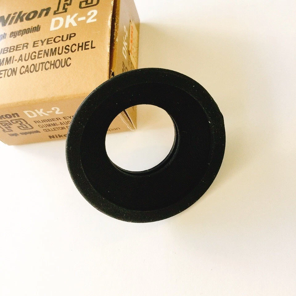 Ocular de goma Nikon DK-2 para punto de vista alto F3T F5 F4 F4s manuales en inglés Foto 3 de 4