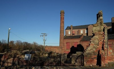 Remnants old factory along railroad tracks venerable recent historic photo