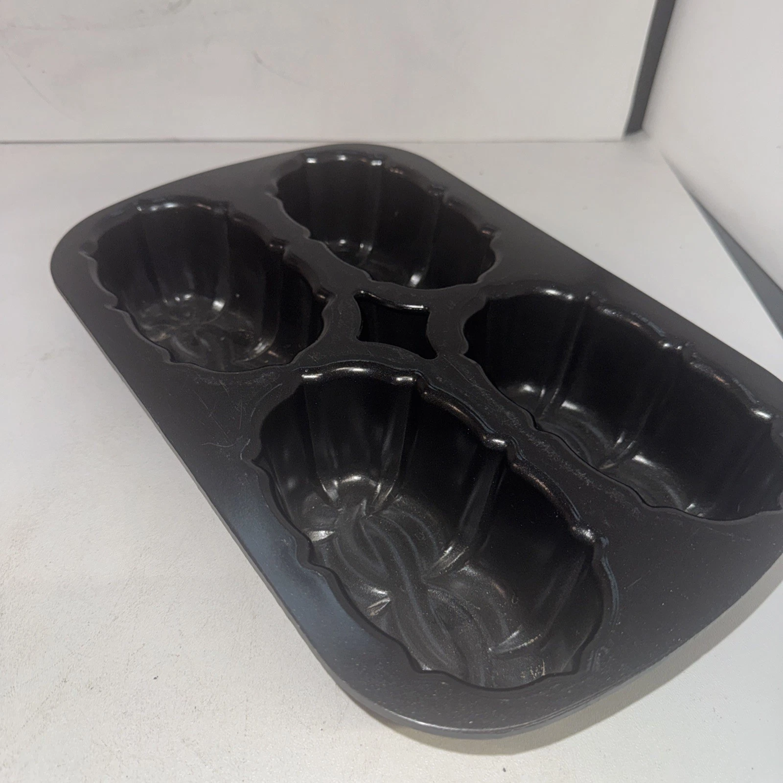 NordicWare 4 mini bunt loaf heavy duty baking pan 13x9" Bake ware pans
Opens in a new window or tab