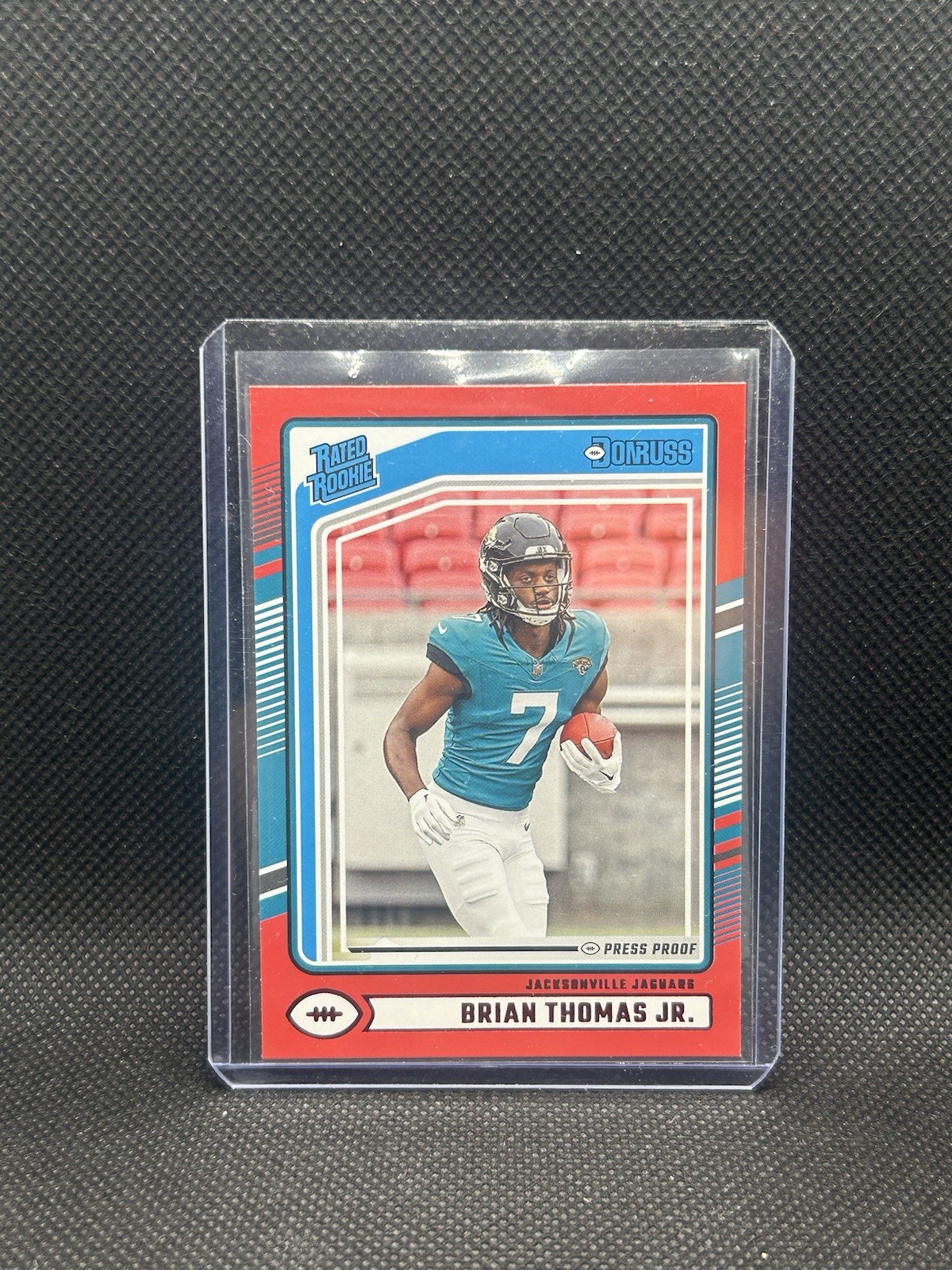 2024 Panini Donruss - Rated Rookie Brian Thomas Jr. #313 Press Proof Red (RC)