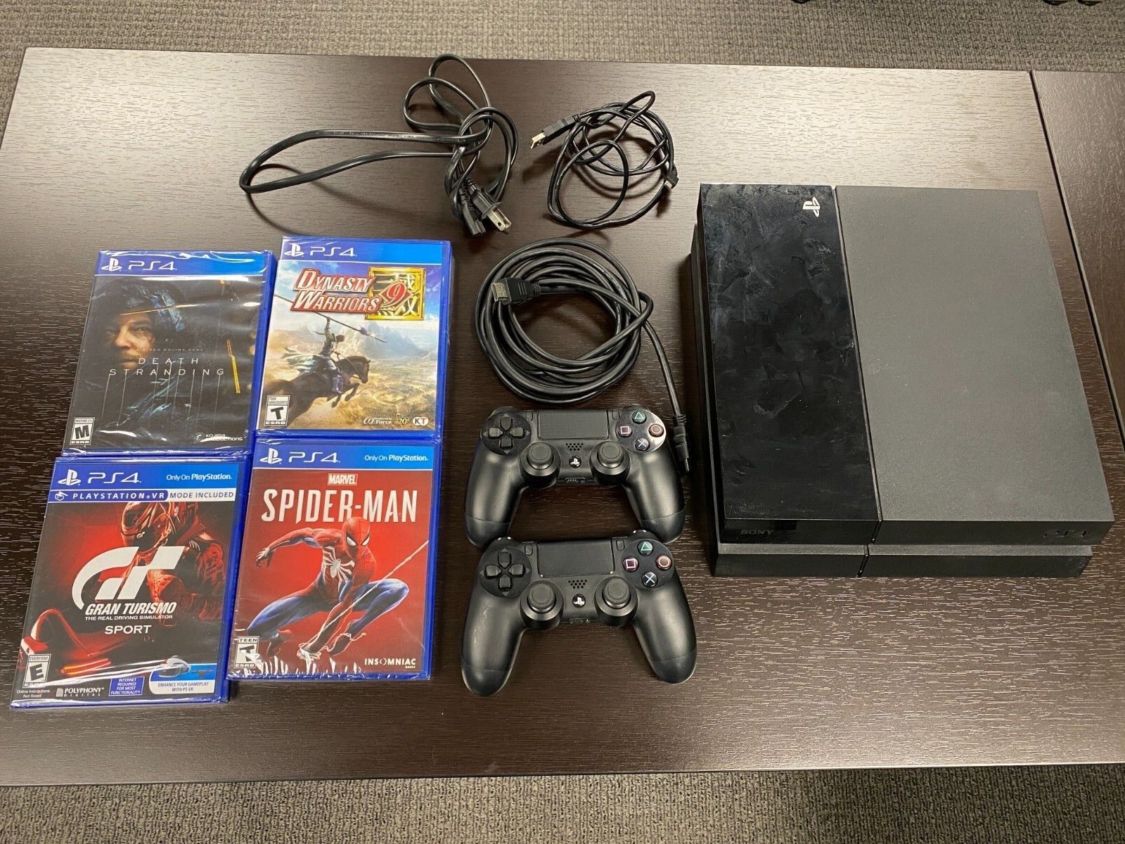 Used PS4 500GB system (CUH-1001A) with 2 DualShock 4 controllers + 