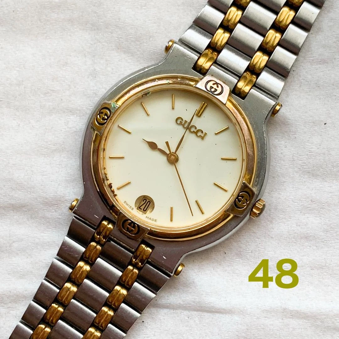 Montre bracelet pour homme Gucci 9000M or argent cadran ivoire deux tons date quartz