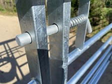 Spring loaded slide both for metal gates direct replacement for farm gates IAE