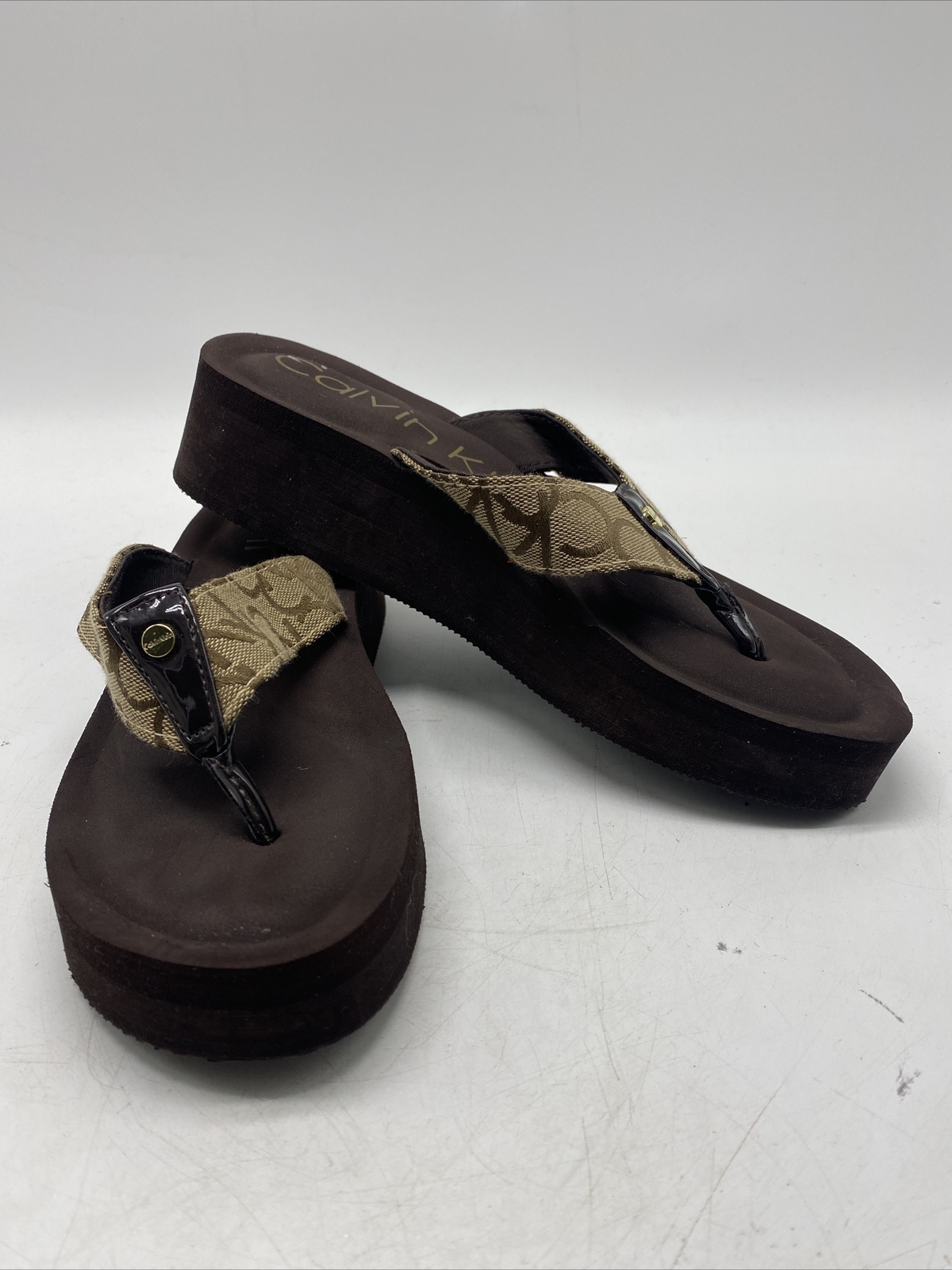 calvin klein mulan flip flops