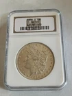 1886-O Morgan Silver $1 - Graded by NGC AU55