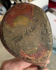 vintage Tour Model 3 oil-hardened persimmon wood golf club.