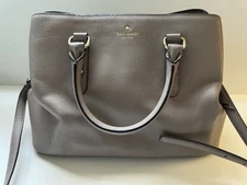 KATE SPADE Larchmont Ave Evangeline. Pre-Owned. Gray w/gold hardware WKRU5376