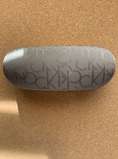 Calvin Klein Gray Monogram Clamshell Glass Case