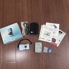 Canon PowerShot SD1300 IS 12.1 Digital ELPH 4...