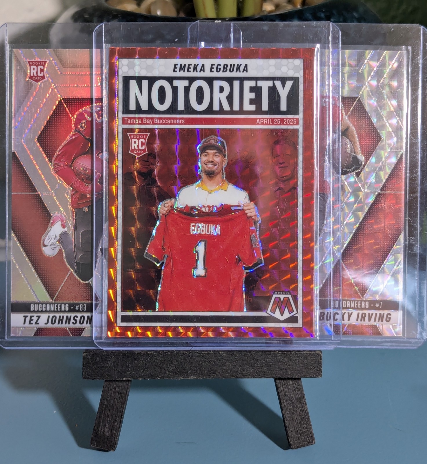 2025 Panini Mosaic Notoriety Emeka Egbuka #16 Red Mosaic Tez Rc Bucky Buccaneers
