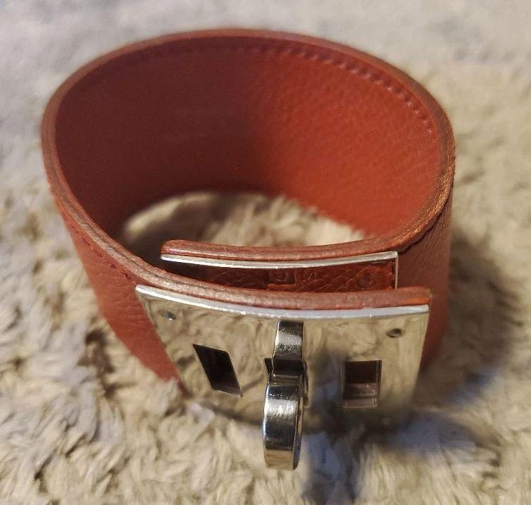 HERMÈS Bracciale cane Hermes Kelly metallo Epson argento marrone
