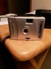 Bell Howell 35 MM CAMERA AND BELT CASE