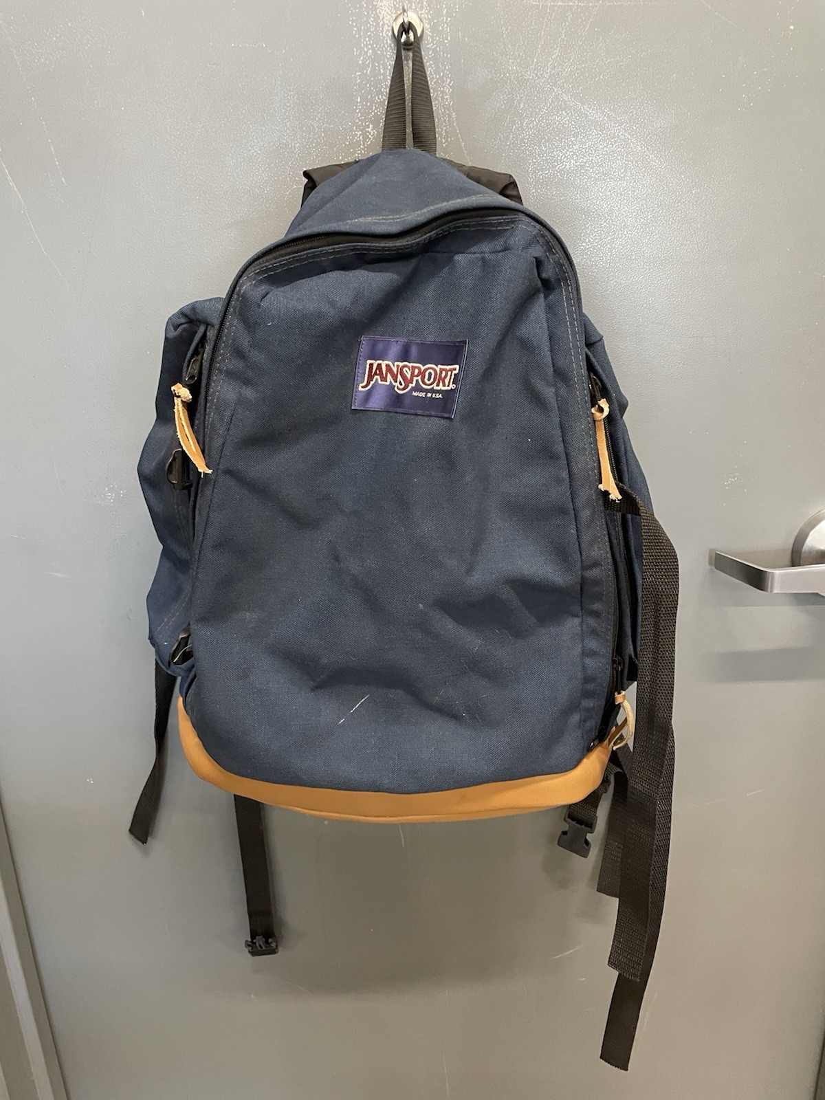 navy blue jansport backpack with brown leather one pocket Right Pack Its finally come into its own as a feature JanSport Right Pack Expressions Backpack