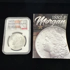 1882 Morgan Silver Dollar $1 - NGC BU / .9 / w/Redbook Info Sheet - No Reserve!