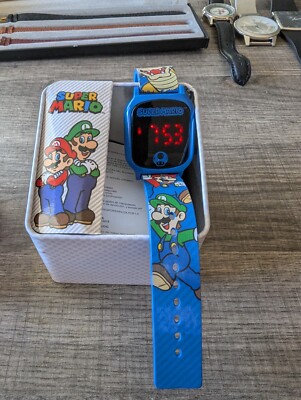 3.  Rare Mario Brothers Watch Exclusive in metal tin box