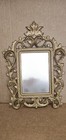 Vintage-style vanity mirror features a gold-finished cast iron frame — photo 1